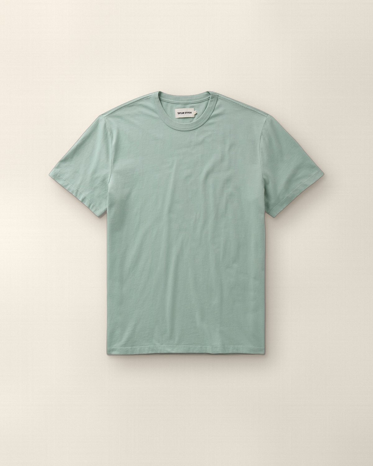 Taylor Stitch Regenerative Cotton Tee in Faded Pine, Stapl studio still